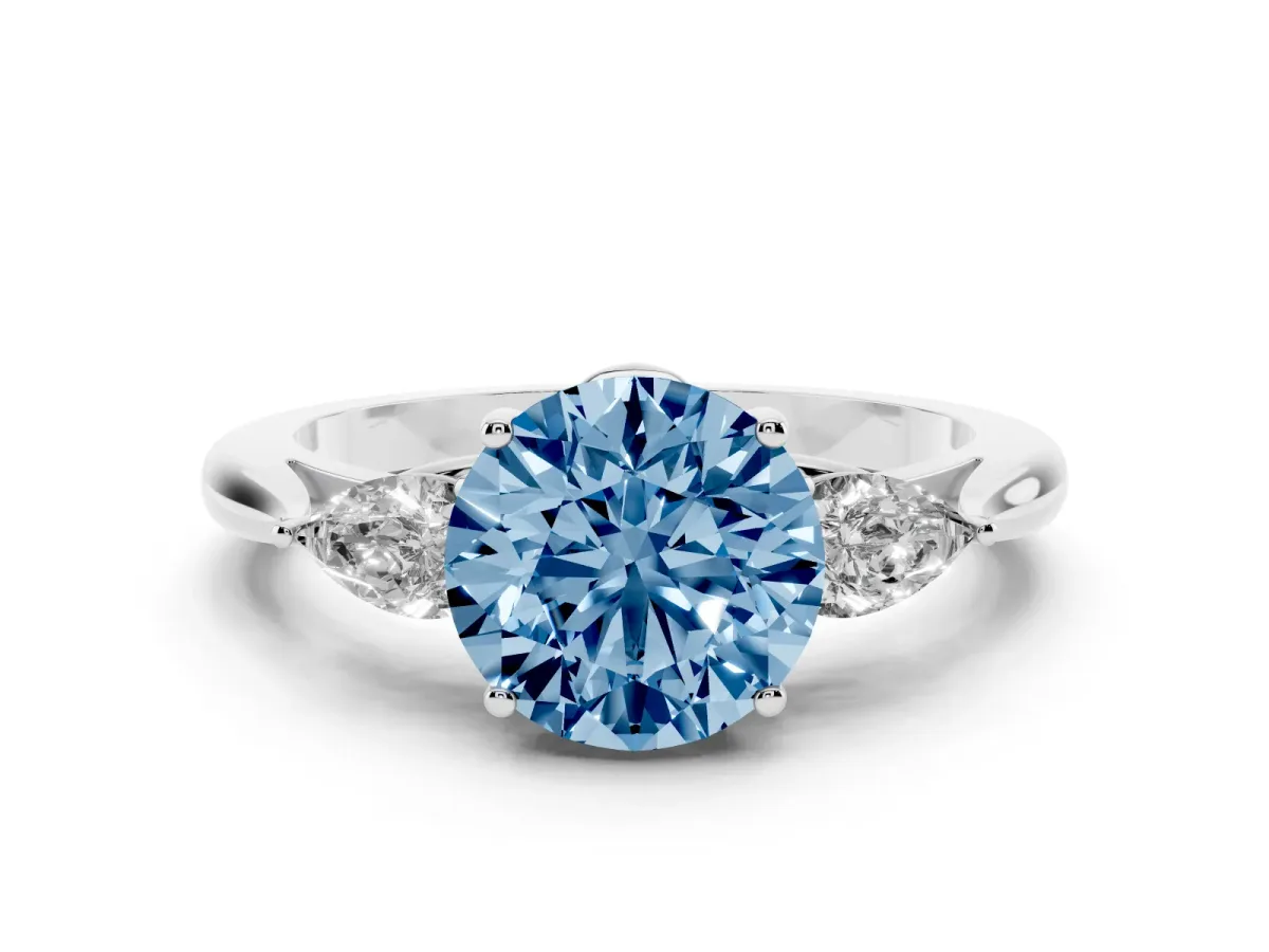 Fancy Blue Three-Stone Round Cut Diamond Ring with Pear Side Stones in Four-Prong Setting Silver