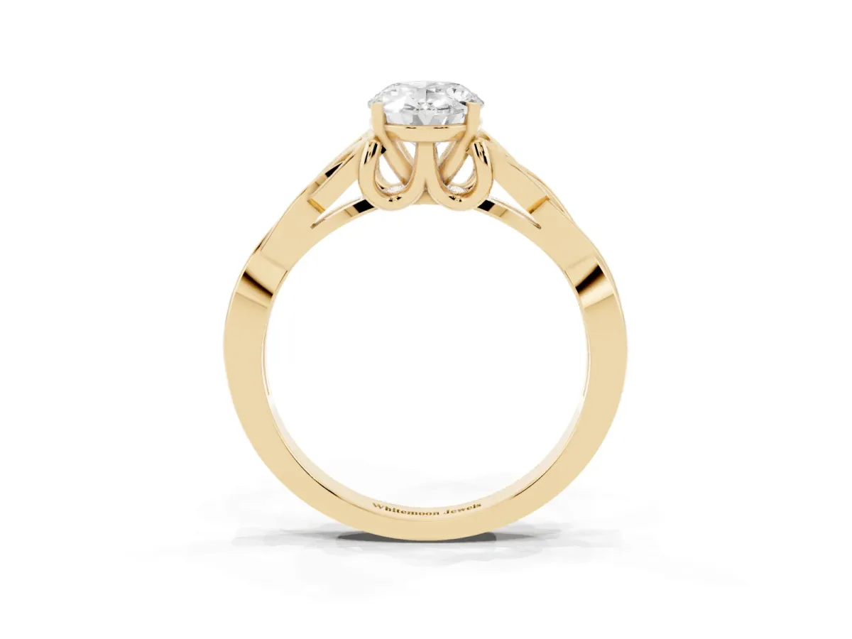Oval Cut Diamond Solitaire Engagement Ring with Celtic Knot Band and Four-Prong Setting Yellow gold