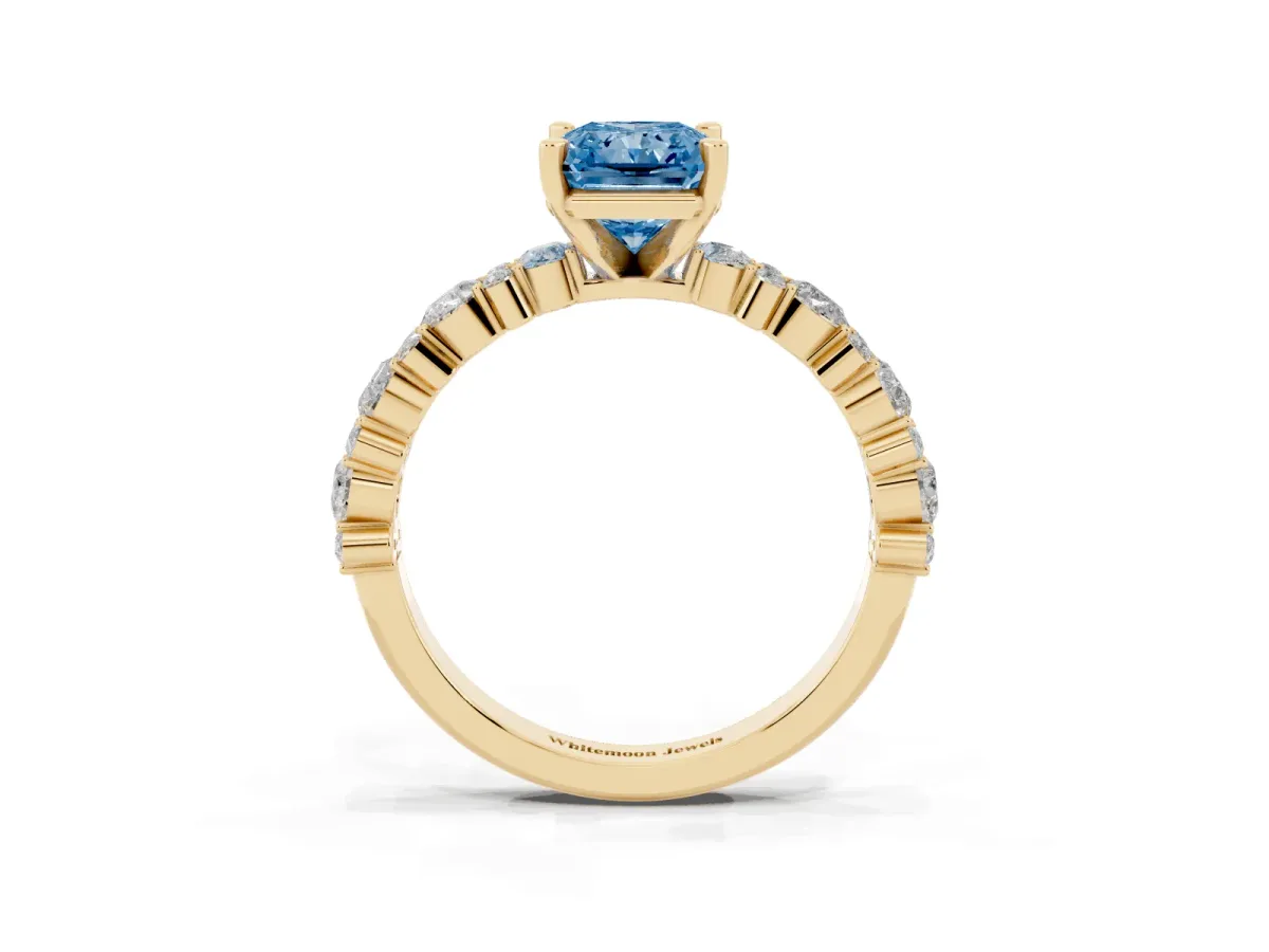 Fancy Blue Radiant Cut Diamond Side Stone Solitaire Ring with Round and Four-Prong Setting Yellow gold