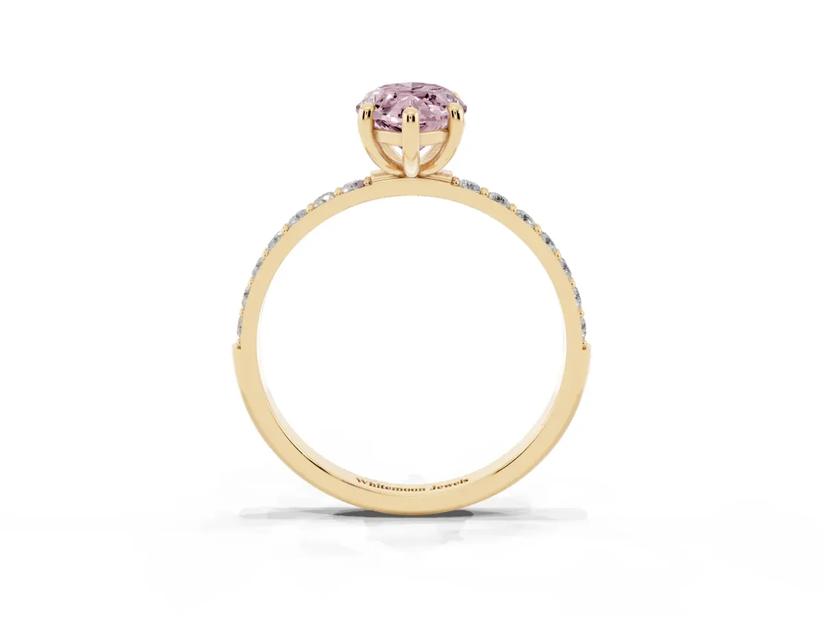 Fancy Pink Marquise Cut Diamond Solitaire Ring with Round Pavé Band and Prong Setting Yellow gold