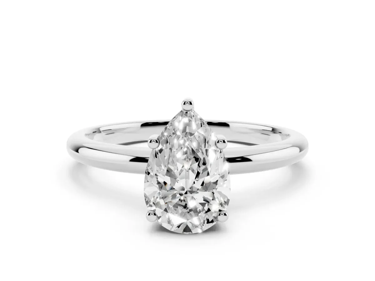 Pear Cut Cut Solitaire Engagement Ring with Four-Prong Setting and Classic Band Silver