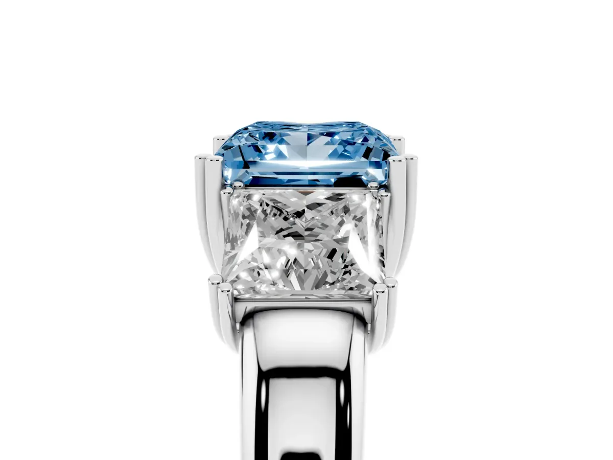 Fancy Blue Three-Stone Princess Cut Cut Diamond Ring with Channel Set Band and Four-Prong Setting Platinum