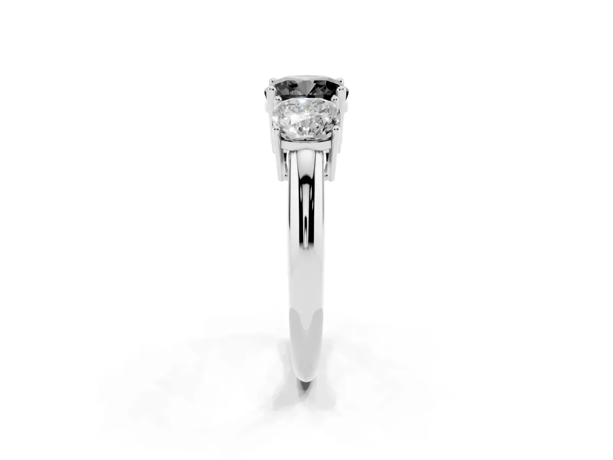 Fancy Black Three-Stone Cushion Cut Cut Diamond Engagement Ring with Prong Setting on a White Gold Band Platinum