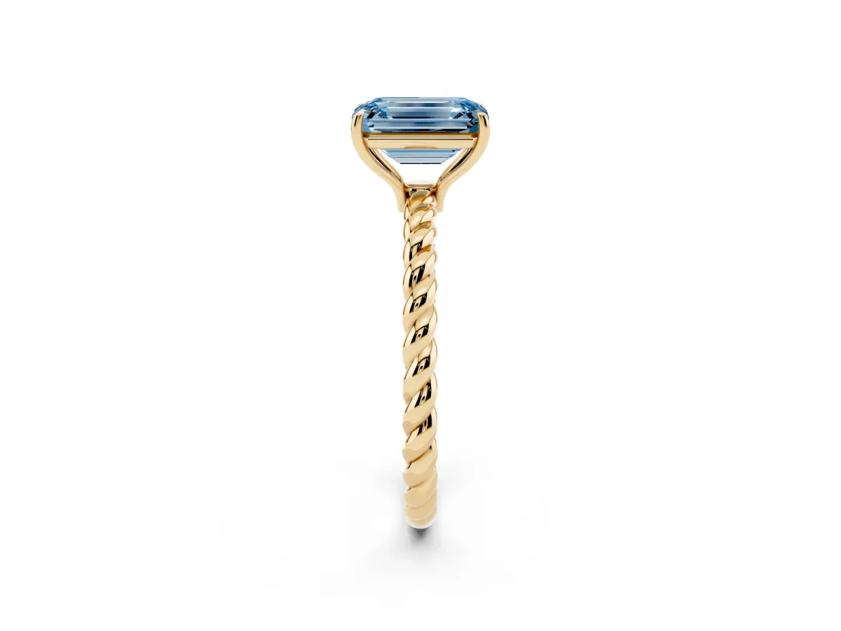 Fancy Blue Emerald Cut Solitaire Twist Band Ring with Four-Prong Setting Yellow gold