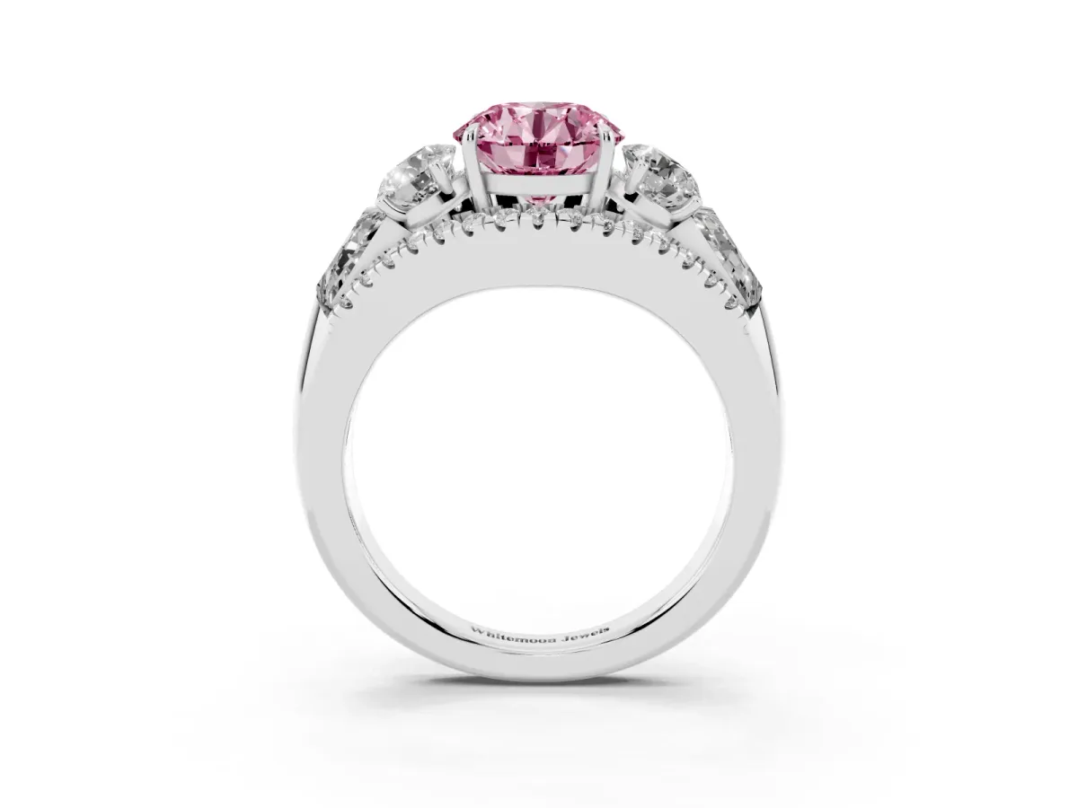 Fancy Pink Three-Stone Round Cut Diamond Engagement Ring with Pave Band and Prong Setting Silver