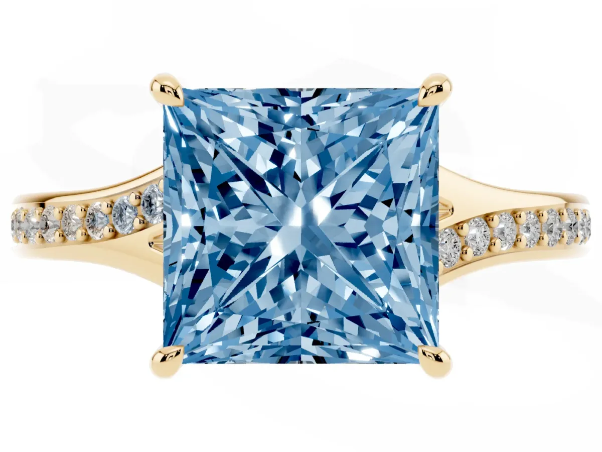 Fancy Blue Princess Cut Diamond Solitaire Ring with Pavé Band and Prong Setting Yellow gold