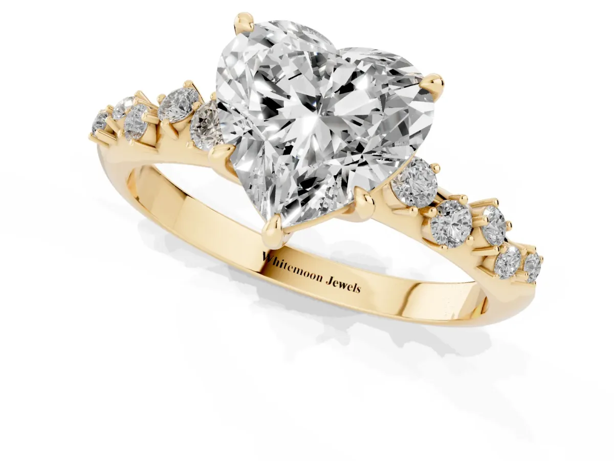 Heart Cut Diamond Cluster Side Stone Solitaire Ring with Prong Setting Yellow gold