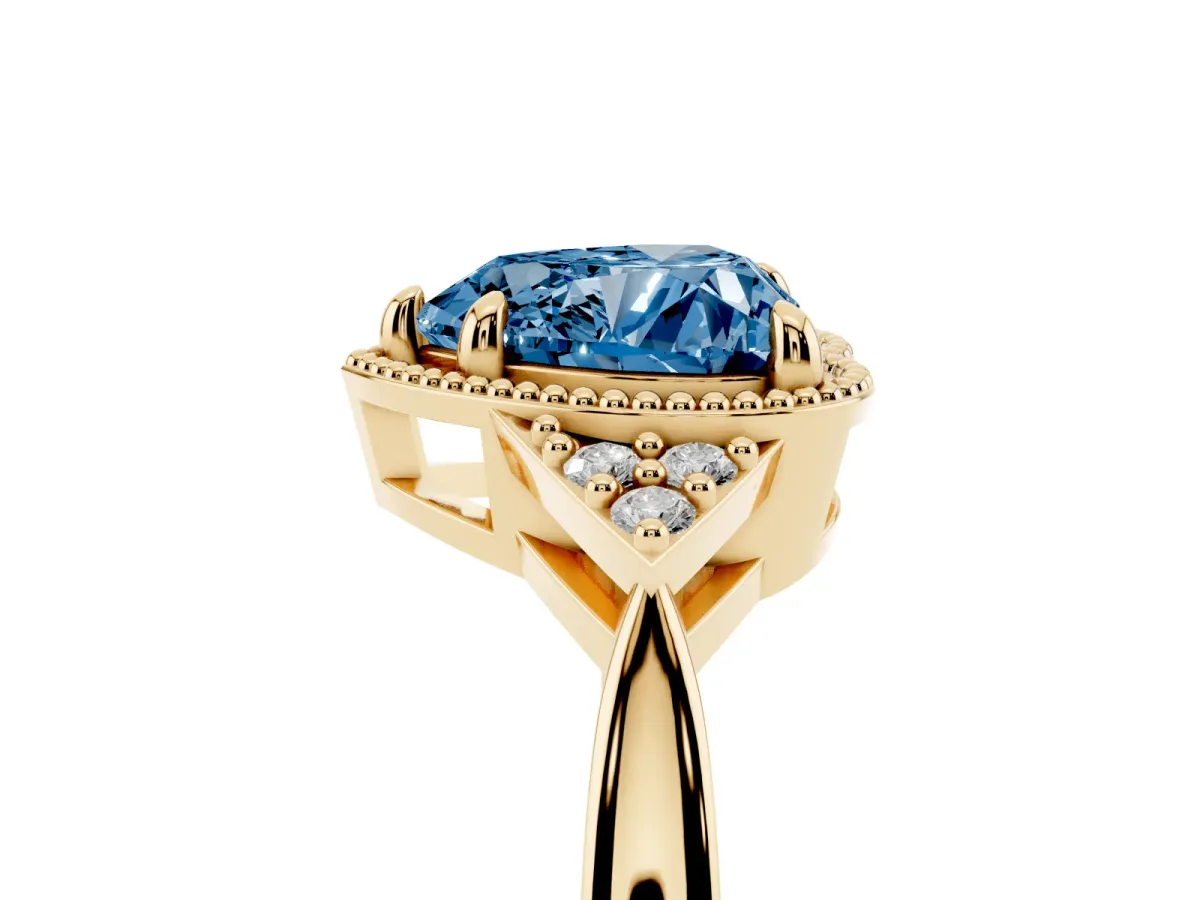 Fancy Blue Milgrain Heart Cut Cut Diamond Ring with Tapered Pave Band and Four Prong Setting Yellow gold