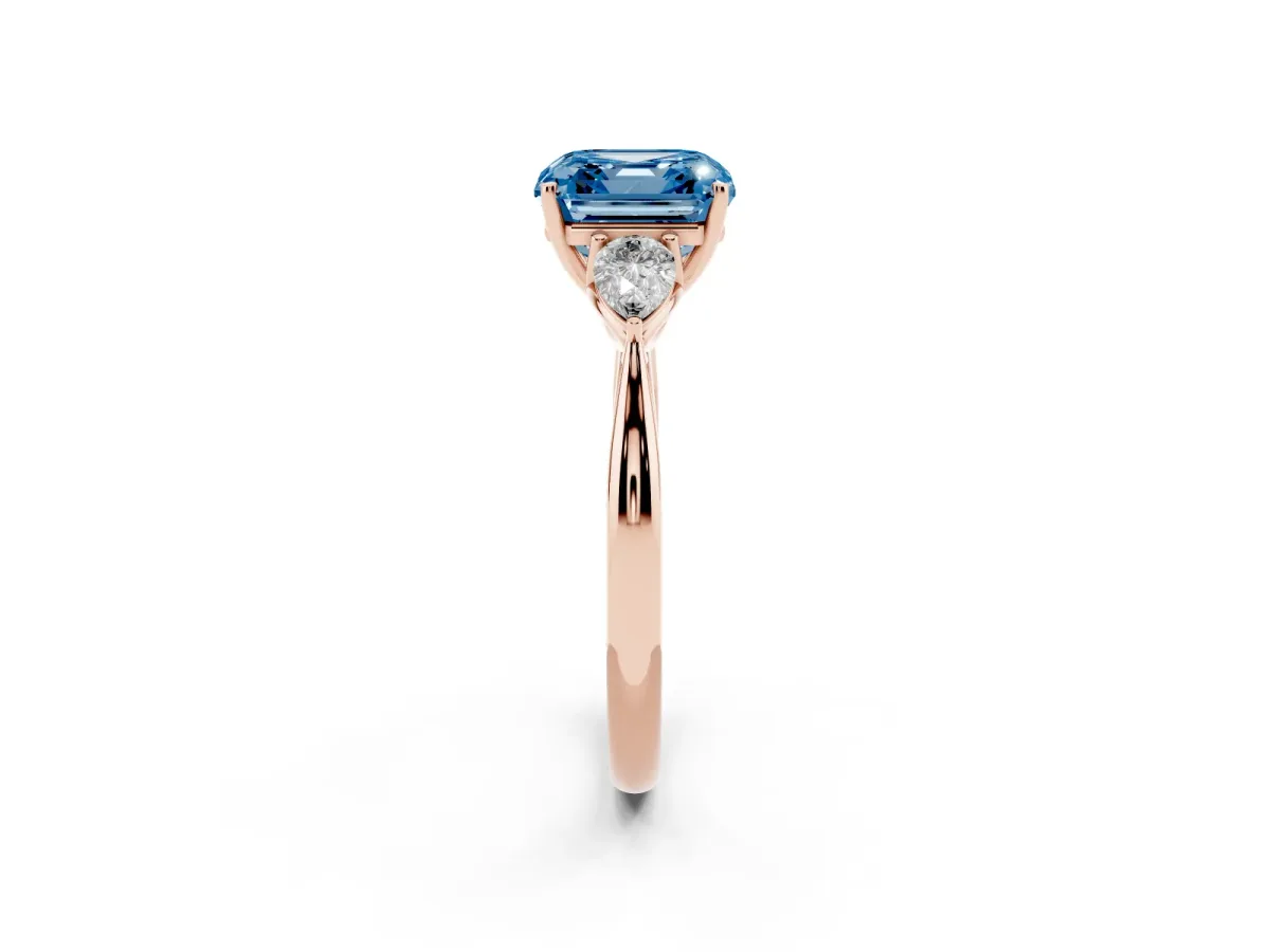 Fancy Blue Three-Stone Asscher Cut Brilliant Diamond Solitaire Ring with Tapered Band and Four-Prong Setting Rose gold