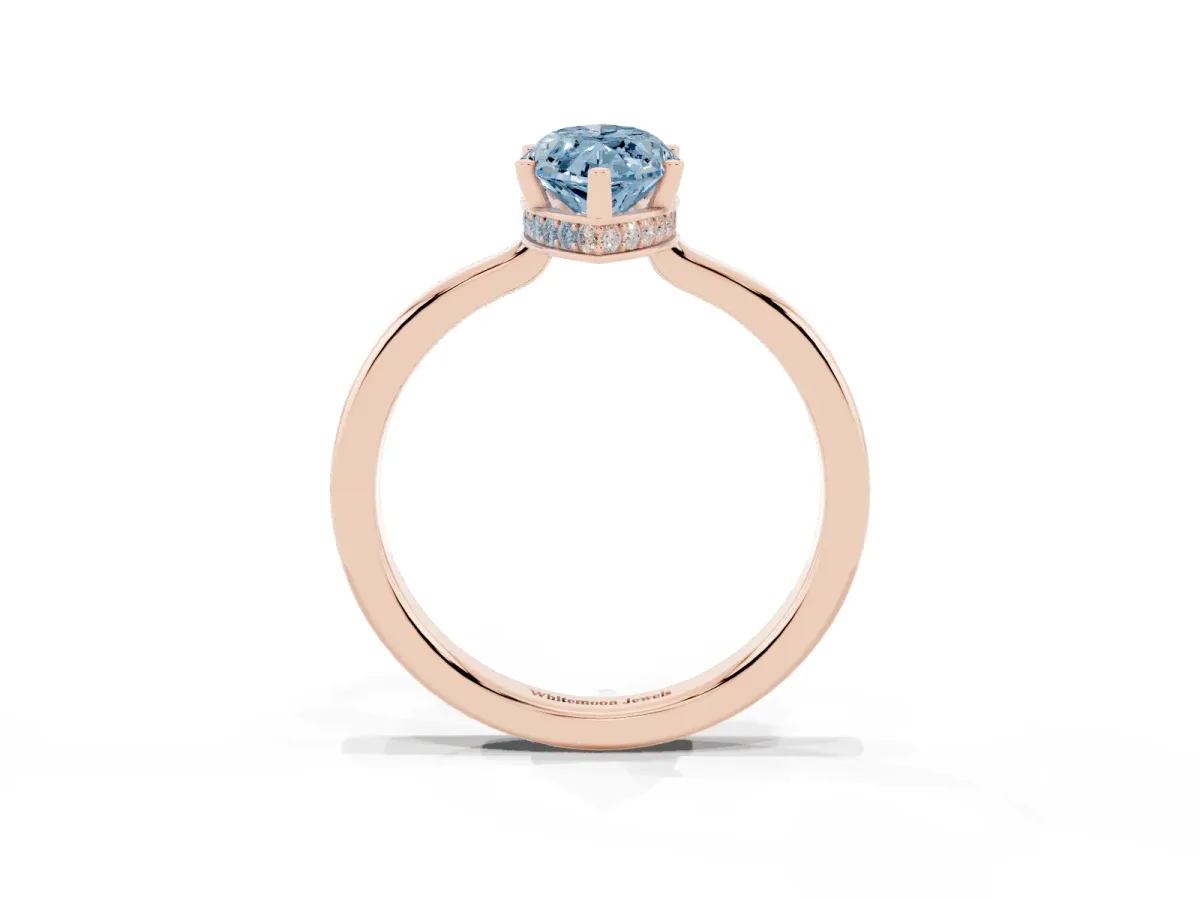 Fancy Blue Marquise Cut Cut Solitaire Engagement Ring with Four-Prong Setting on a Classic Band Rose gold