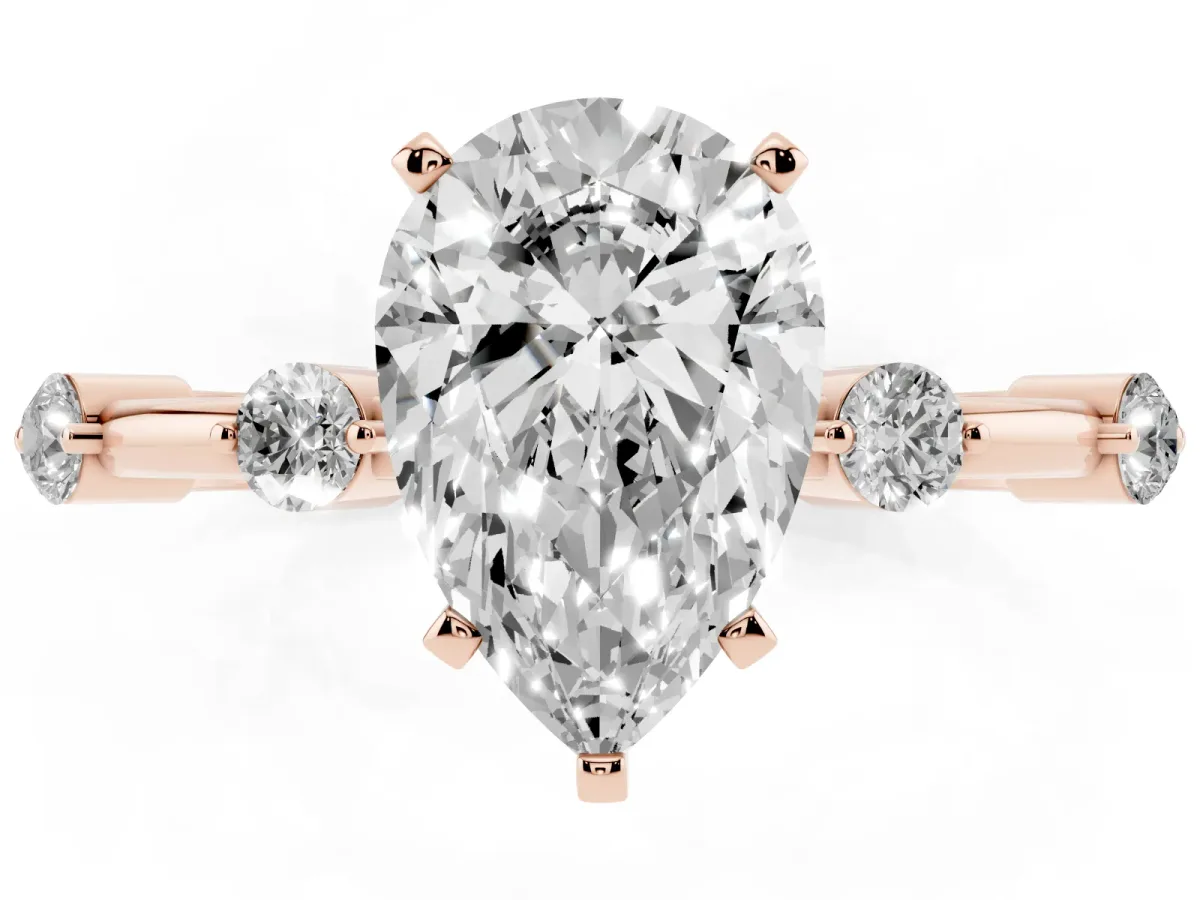 Pear Cut Solitaire Diamond Ring with Bezel Set Side Stones and Prong Setting Rose gold