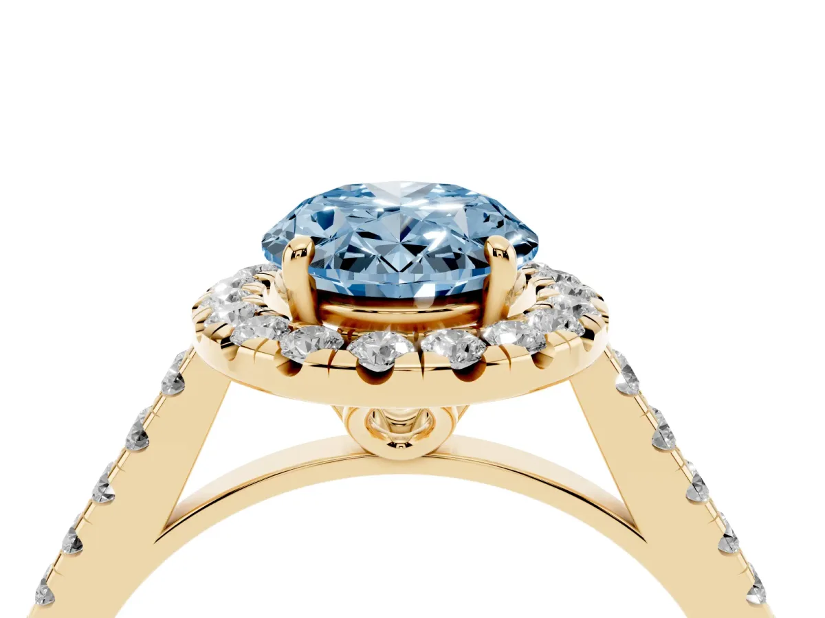 Fancy Blue Oval Cut Halo Pavé Diamond Engagement Ring with Four-Prong Setting Yellow gold