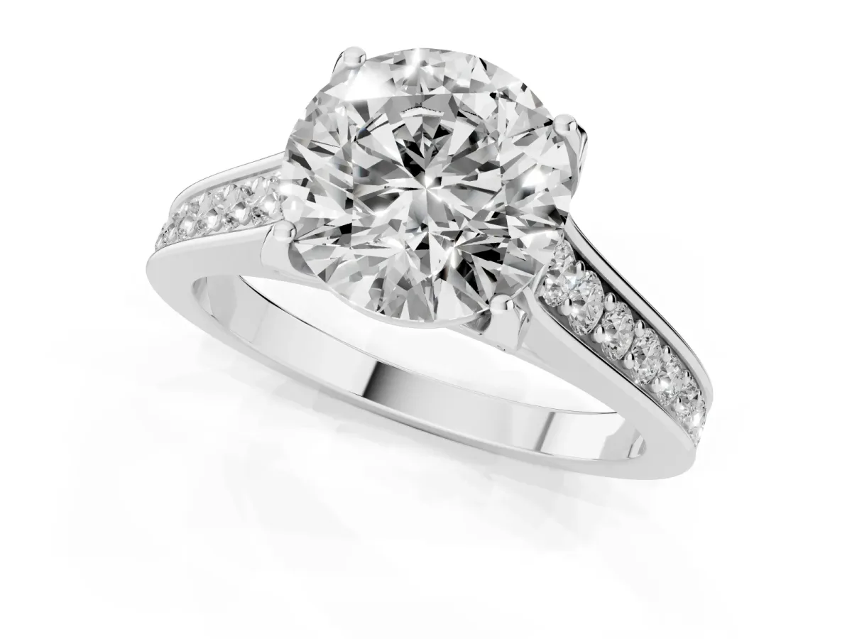 Round Cut Brilliant Cut Diamond Engagement Ring with Pavé Band and Four-Prong Setting Platinum