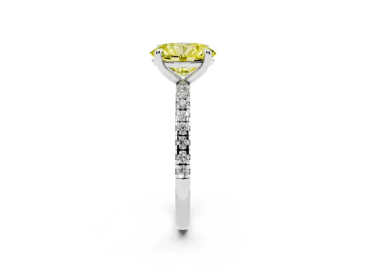 Fancy Yellow Oval Cut Diamond Brilliant Solitaire Ring with Pavé Band and Four-Prong Setting Silver