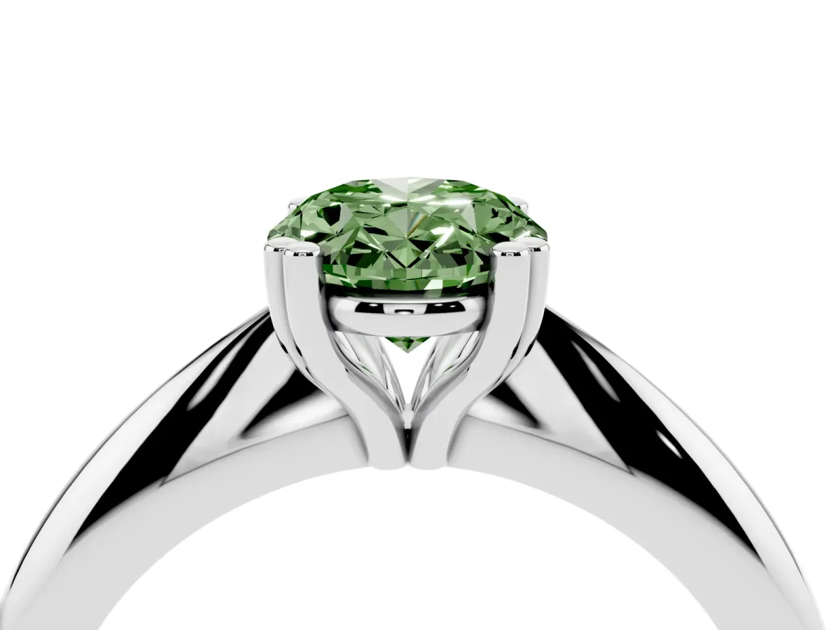 Fancy Green Oval Cut Cut Solitaire Engagement Ring with Tapered Band and Four-Prong Setting Silver
