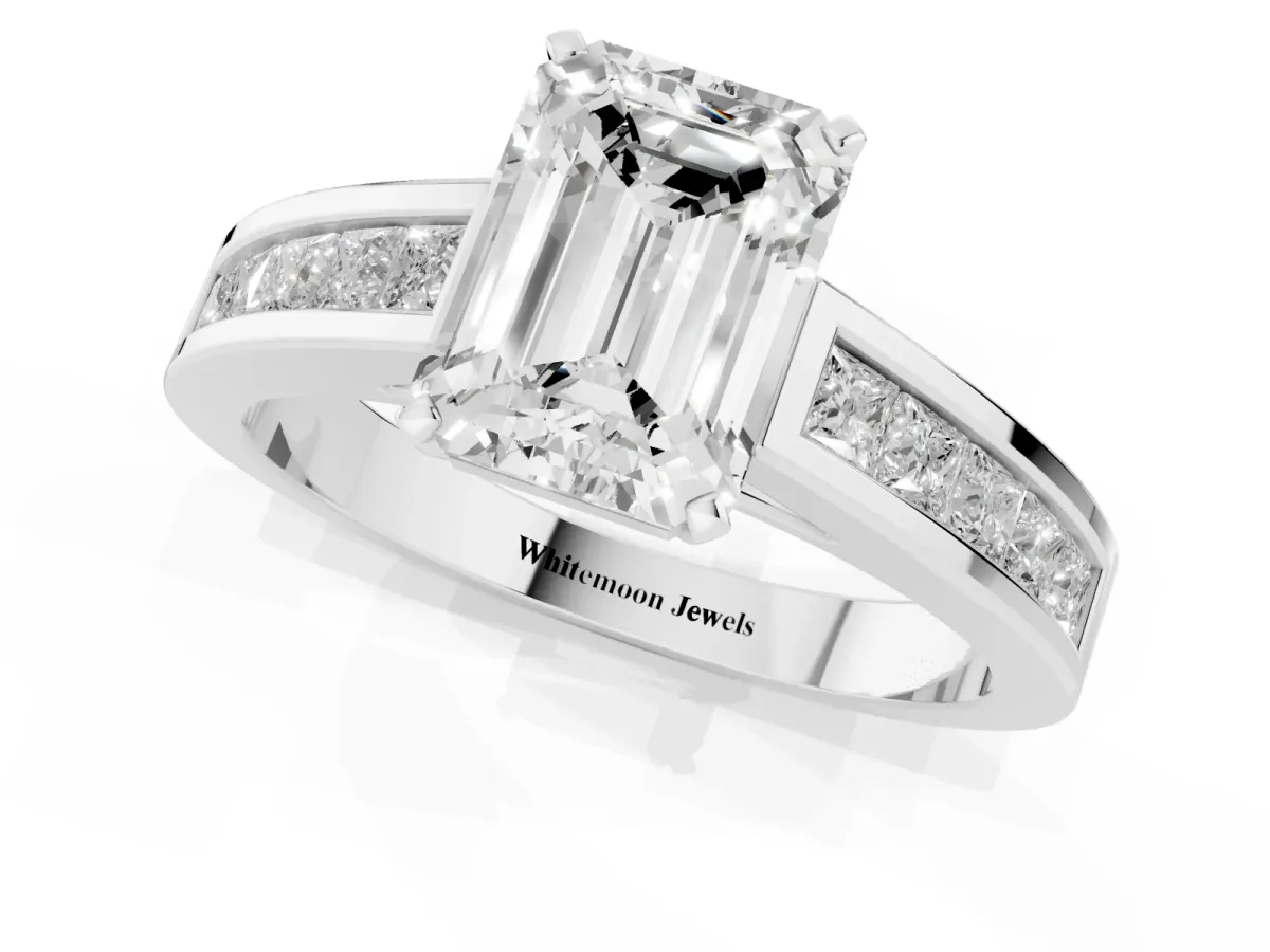 Emerald Cut Solitaire Diamond Ring with Channel-Set Band and Four-Prong Setting Platinum