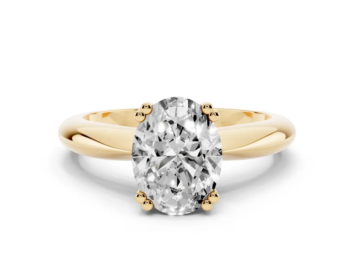 Oval Cut Cut Solitaire Engagement Ring with Tapered Band and Four-Prong Setting Yellow gold