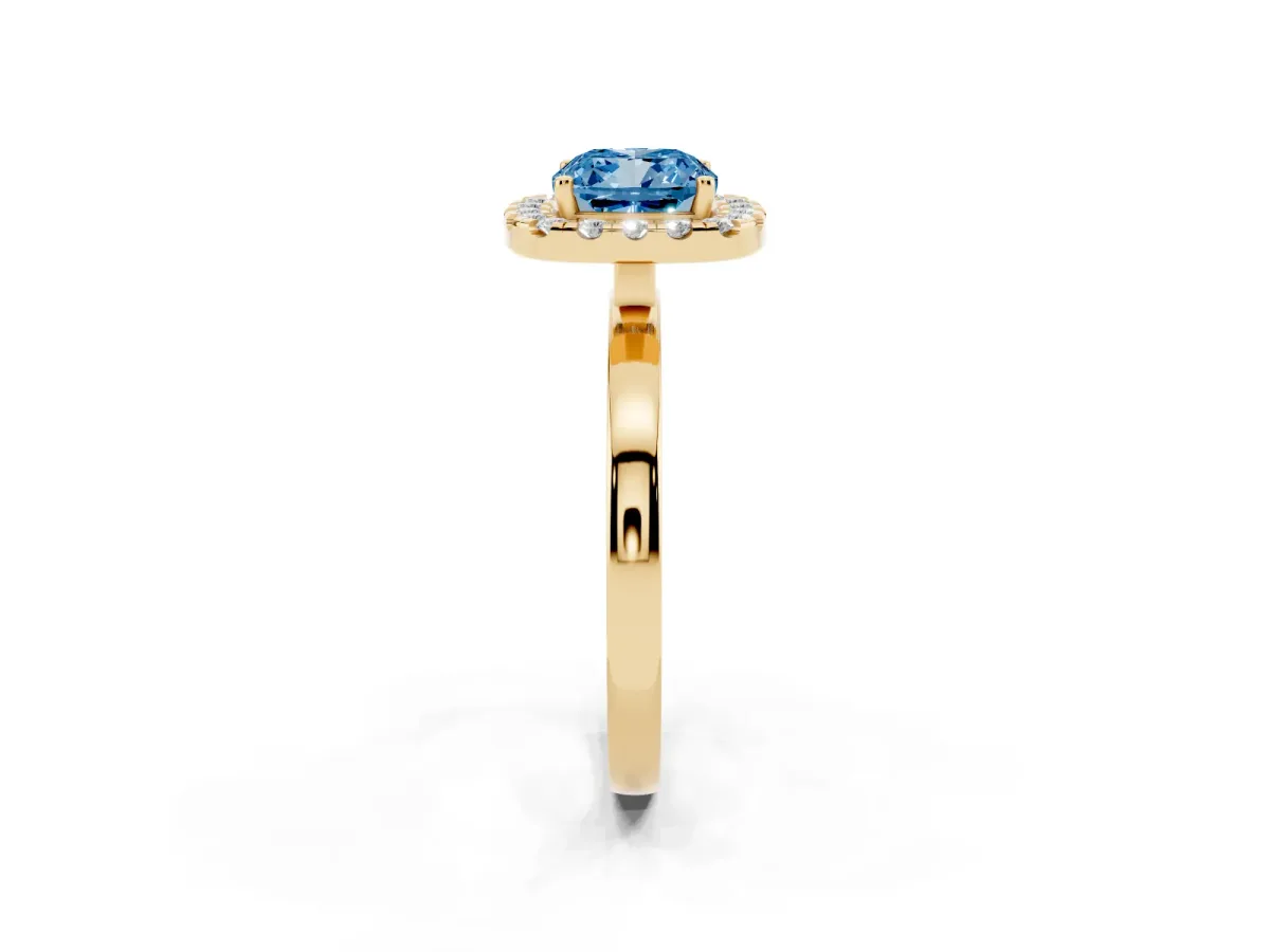 Fancy Blue Cushion Cut Halo Diamond Solitaire with Pavé Band and Four-Prong Setting Yellow gold