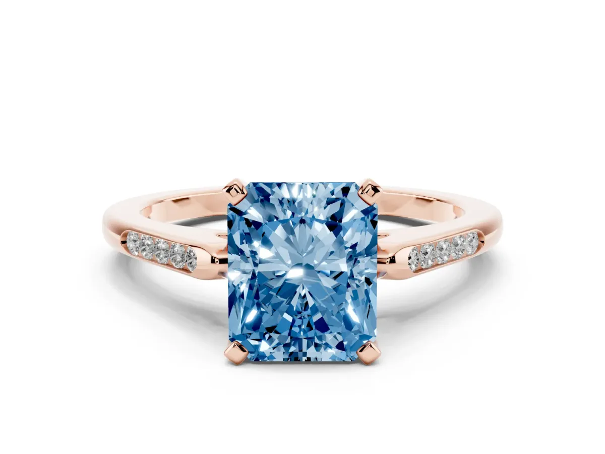 Fancy Blue Radiant Cut Diamond Solitaire Ring with Channel Set Round Band and Prong Setting Rose gold