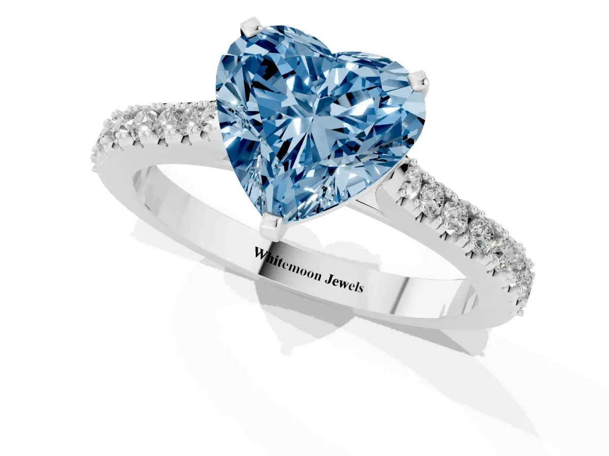 Fancy Blue Heart Cut Cut Solitaire Diamond Engagement Ring with Pave Band and Four-Prong Setting White gold
