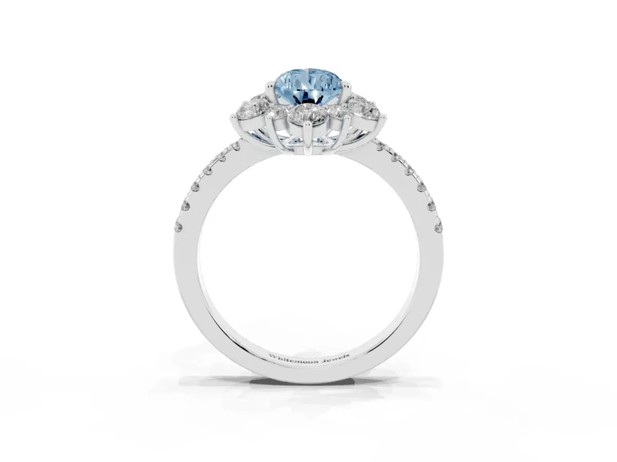 Fancy Blue Pear Cut Diamond Floral Halo Ring with Round Pavé Band and Prong Setting Platinum