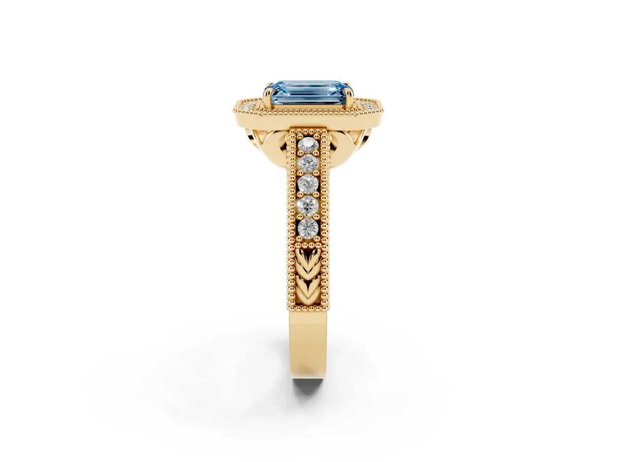 Fancy Blue Emerald Cut Cut Halo Diamond Ring with Pavé Band and Four-Prong Setting Yellow gold
