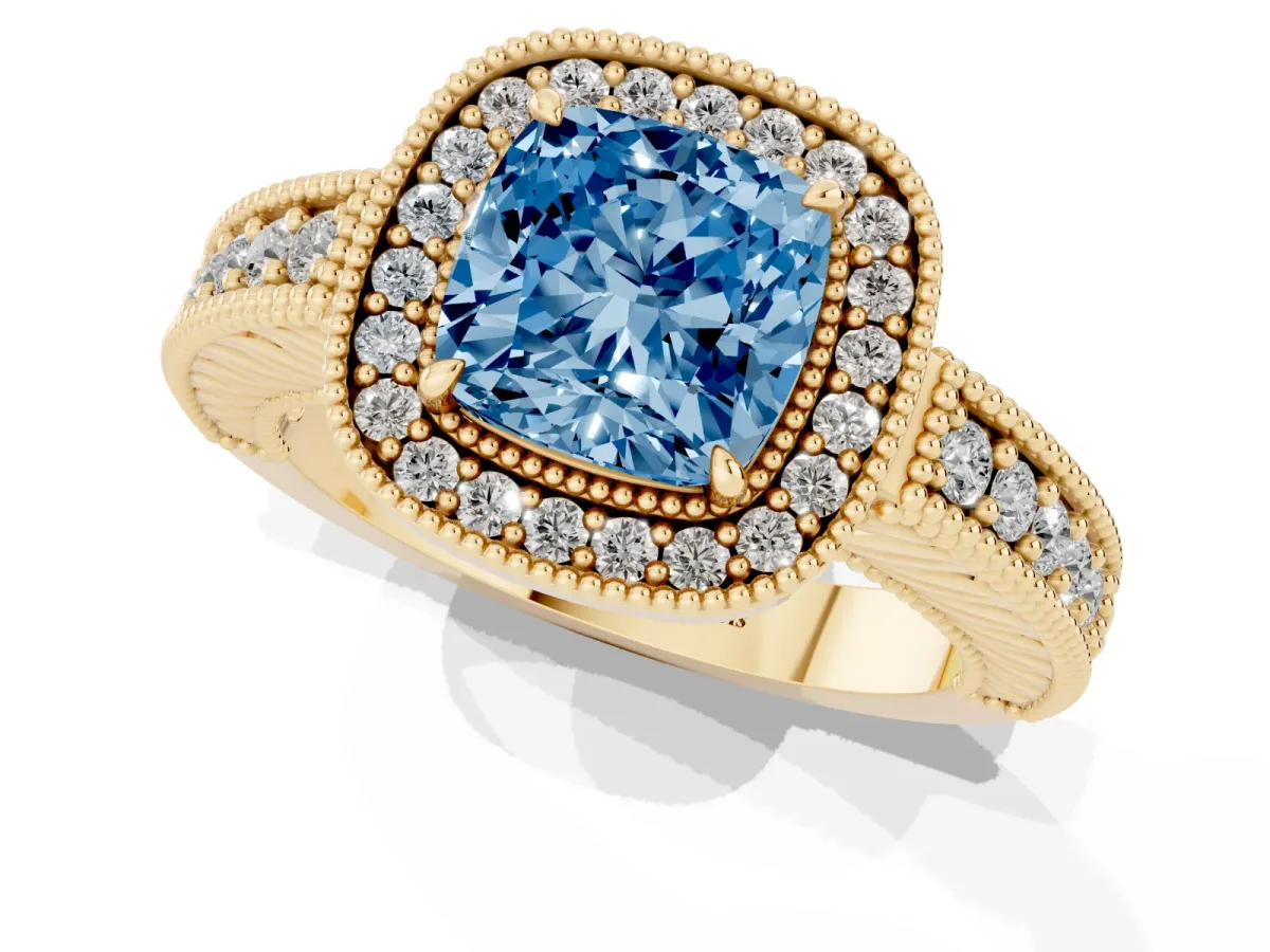 Fancy Blue Cushion Cut Cut Halo Diamond Ring with Pavé Band and Four-Prong Setting Yellow gold