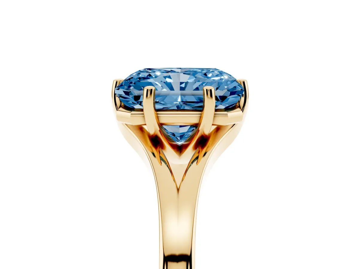 Fancy Blue Radiant Cut Solitaire Diamond Ring with Six-Prong Setting and Tapered Band Yellow gold