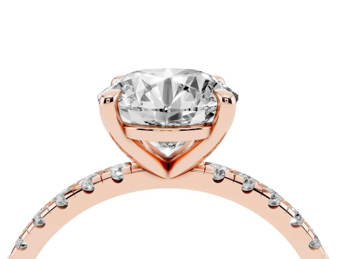 Round Cut Diamond Brilliant Solitaire Ring with Pavé Band and Four-Prong Setting Rose gold