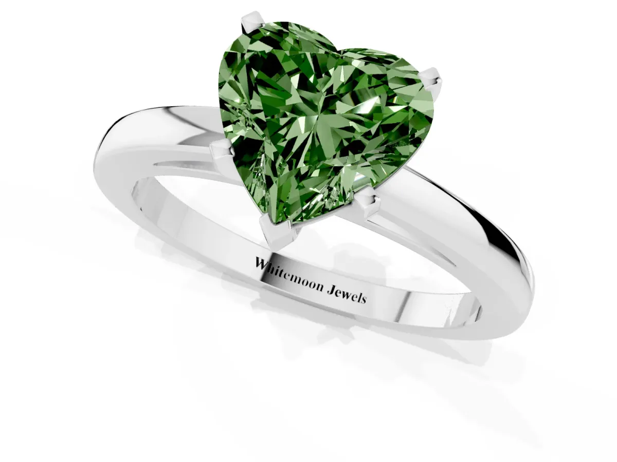Fancy Green Heart Cut Solitaire Diamond Engagement Ring with Four-Prong Setting on a Classic Band Silver