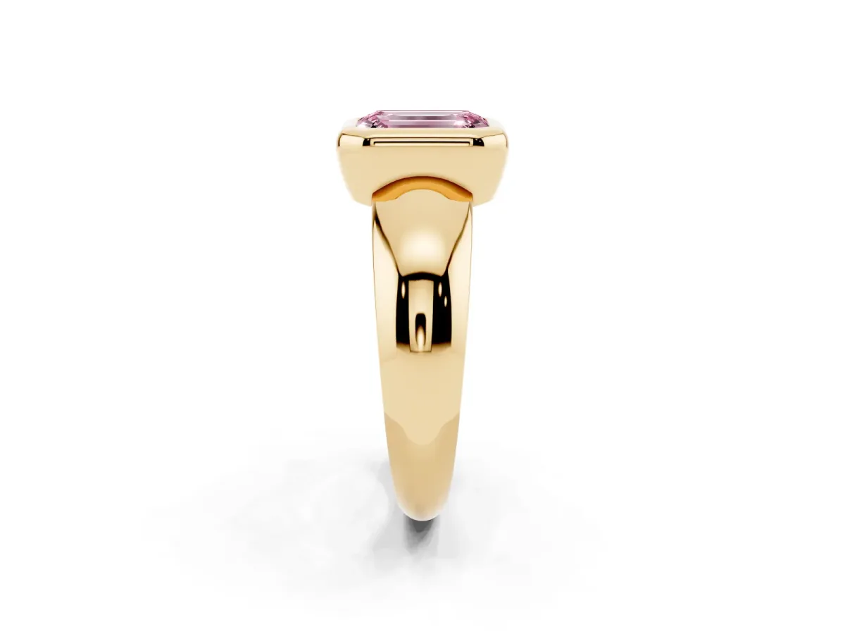 Fancy Pink Bezel Set Emerald Cut Solitaire Ring with Wide Band Yellow gold