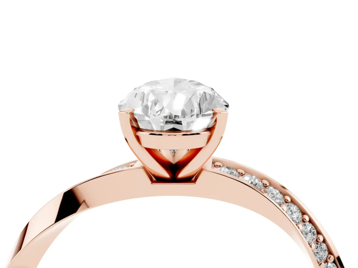 Pear Cut Diamond Engagement Ring with Side Stone Accents and Four-Prong Setting Rose gold