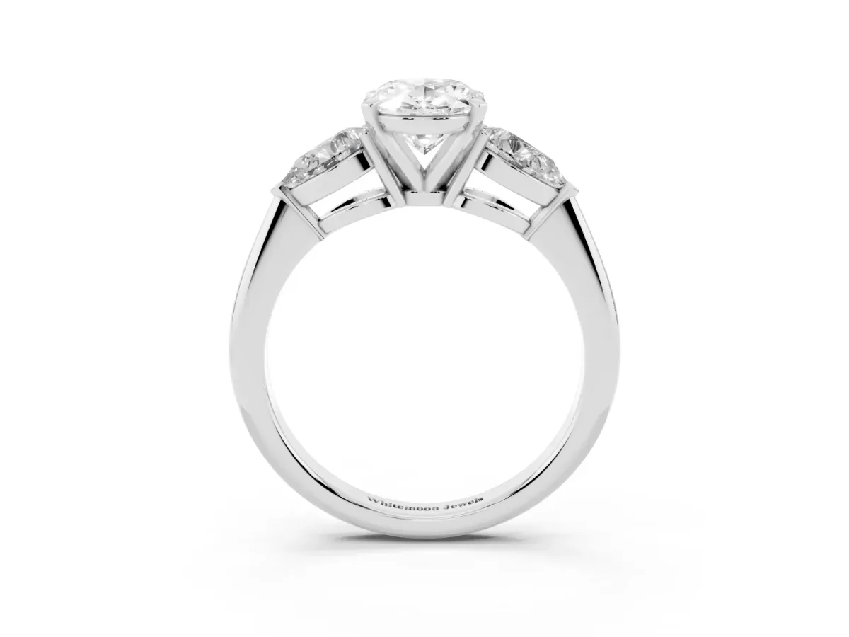 Three-Stone Oval Cut Diamond Ring with Pear Side Stones and Four-Prong Setting White gold