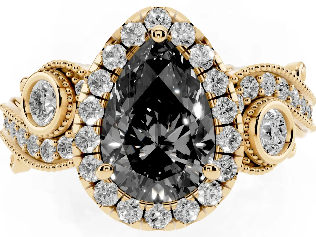 Fancy Black Pear Cut Halo Diamond Ring with Milgrain and Bezel Accents on a Split Shank Band Yellow gold