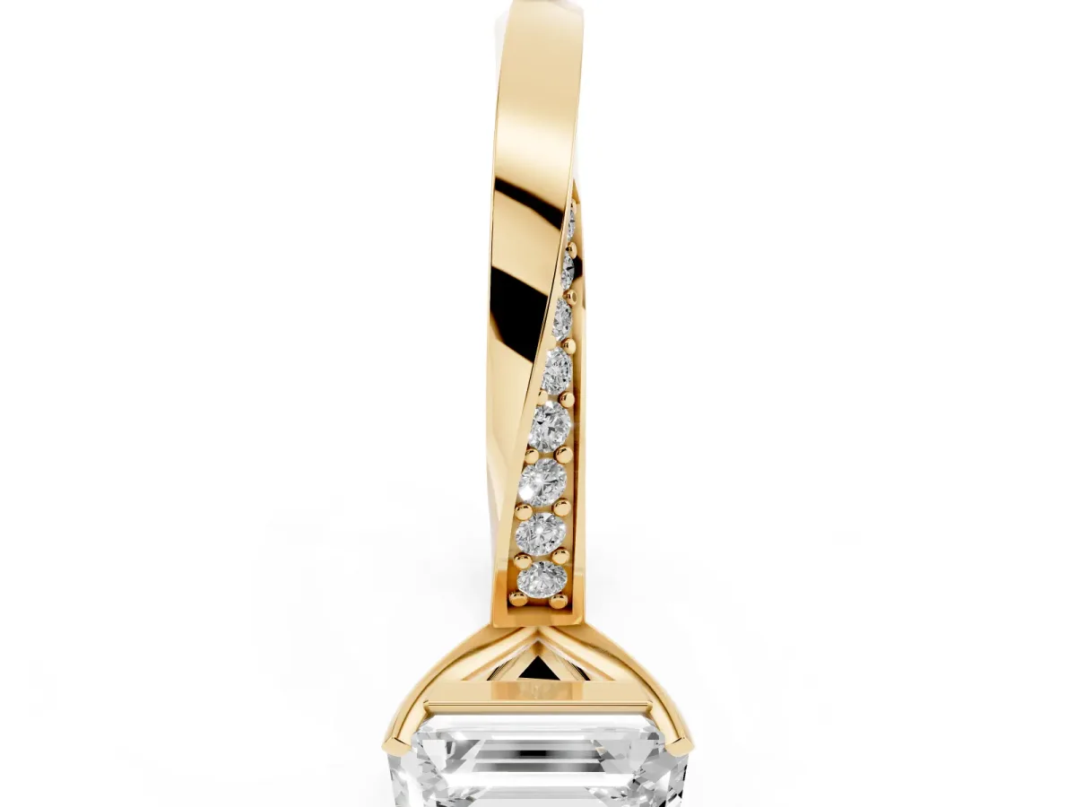 Emerald Cut Diamond Engagement Ring with Side Stone Accents and Four-Prong Setting Yellow gold