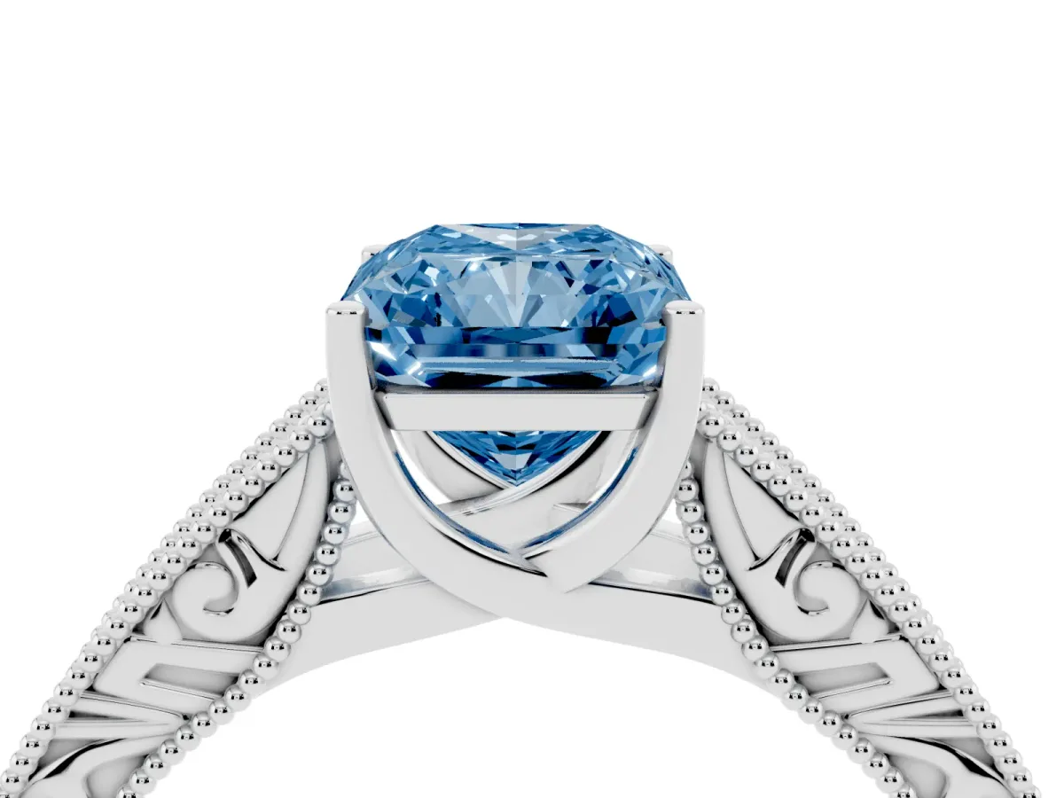 Fancy Blue Radiant Cut Diamond Solitaire Ring with Engraved Band and Four-Prong Setting White gold