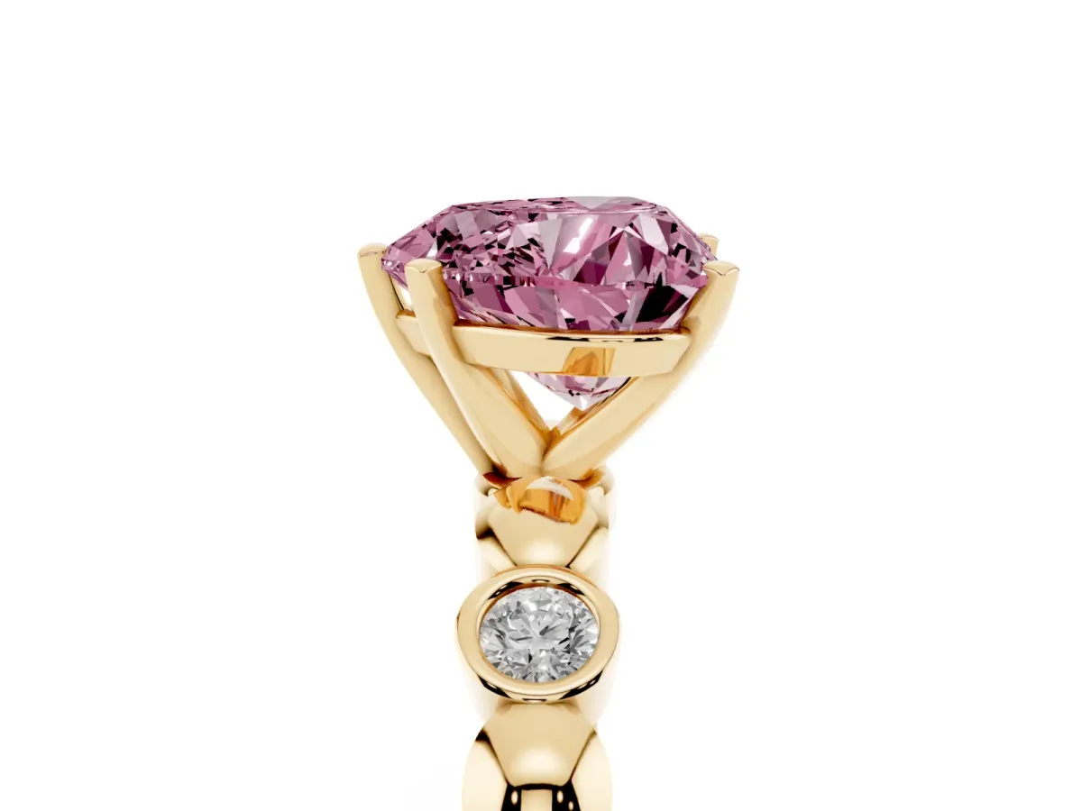 Fancy Pink Heart Cut Solitaire Bezel-Set Diamond Ring with Beaded Band and Four-Prong Setting Yellow gold