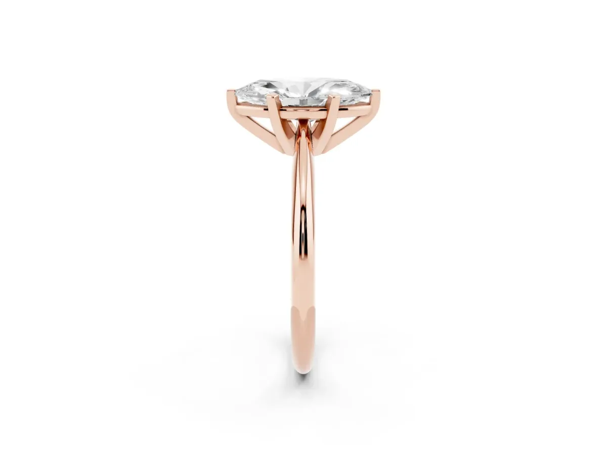 Marquise Cut Cut Solitaire Ring with Four-Prong Setting on a Classic Band Rose gold