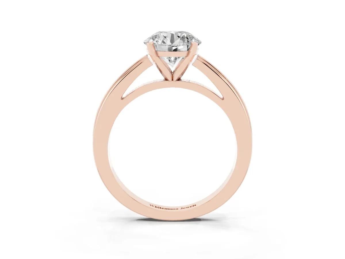 Round Cut Solitaire Diamond Ring with Four-Prong Setting and Classic Band Rose gold