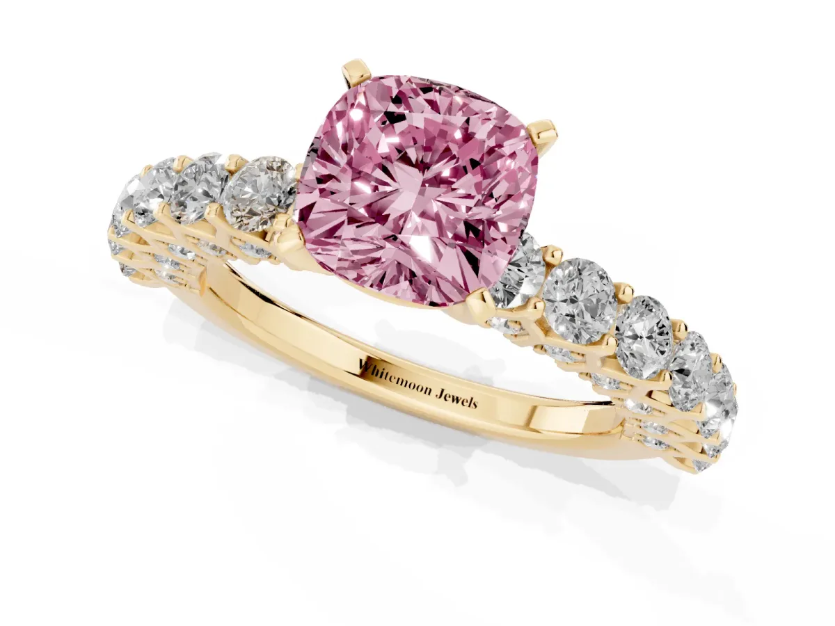Fancy Pink Cushion Cut Diamond Solitaire Ring with Shared Prong Pavé Band and Four-Prong Setting Yellow gold