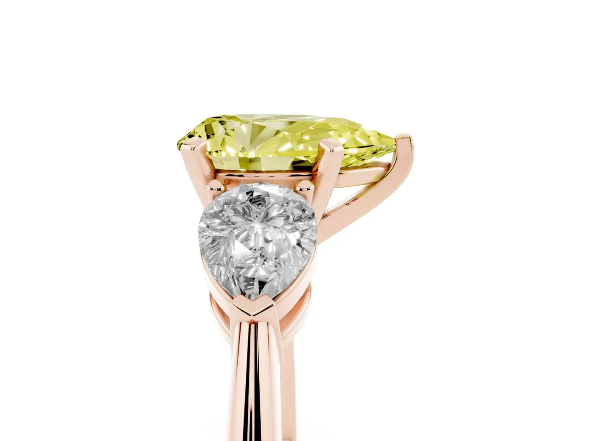 Fancy Yellow Three-Stone Pear Cut Diamond Ring with Pear Side Stones and Four-Prong Setting Rose gold