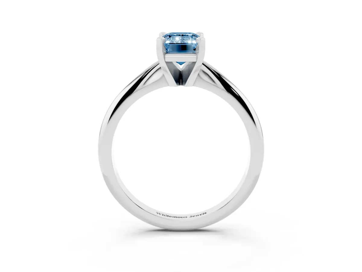 Fancy Blue Emerald Cut Cut Solitaire Ring with Four-Prong Setting on a Classic Band White gold