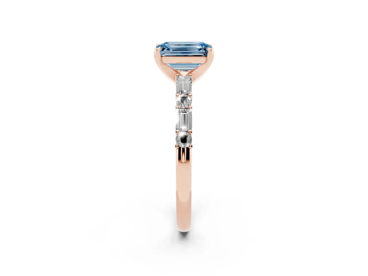 Fancy Blue Emerald Cut Diamond Solitaire with Side Baguettes and Channel Set Band Rose gold