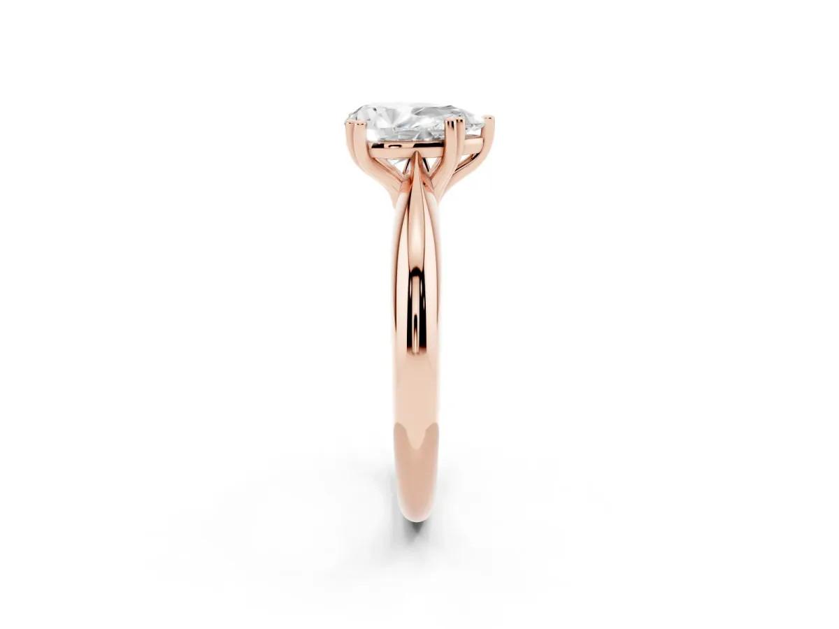 Pear Cut Cut Solitaire Engagement Ring with Tapered Band and Four-Prong Setting Rose gold