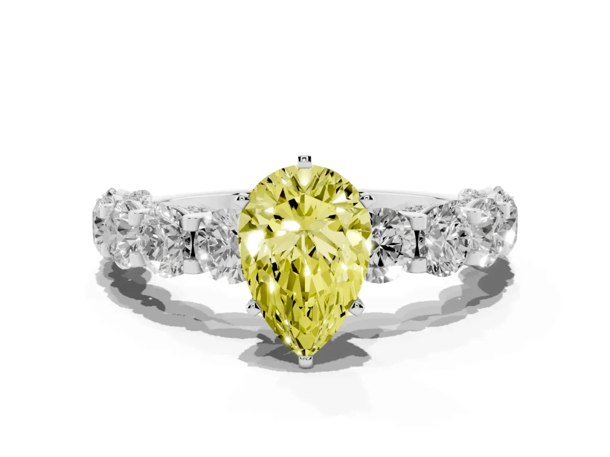 Fancy Yellow Pear Cut Diamond Side Stone Engagement Ring with Four-Prong Setting White gold