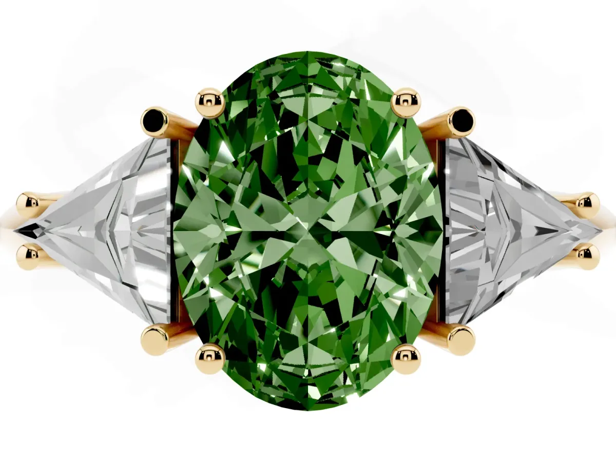 Fancy Green Three-Stone Oval Cut Diamond Engagement Ring with Trillion Side Stones and Prong Setting Yellow gold