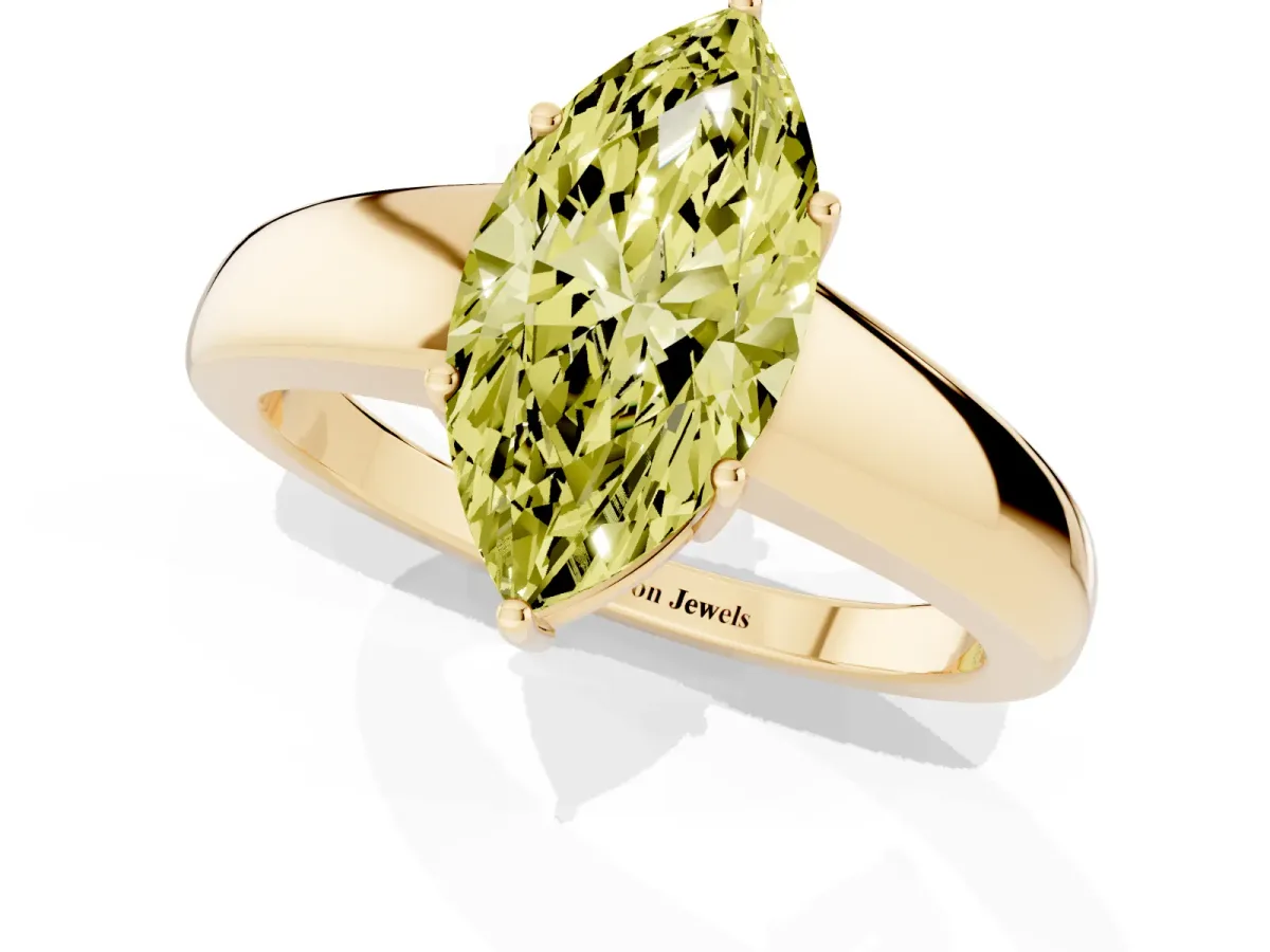 Fancy Yellow Marquise Cut Solitaire Diamond Ring with Tapered Band and Four-Prong Setting Yellow gold