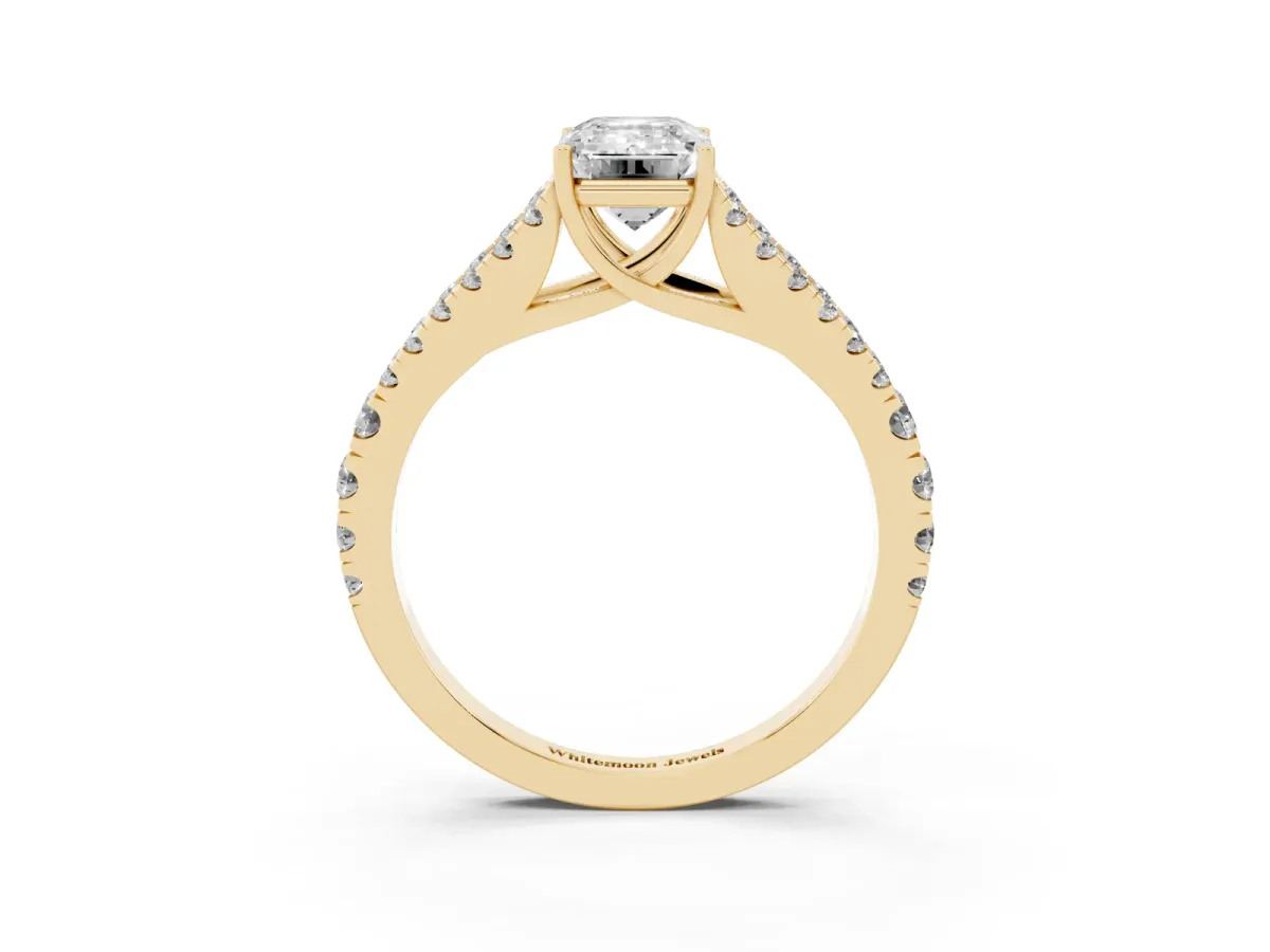 Emerald Cut Diamond Split Shank Engagement Ring with Round Pavé and Prong Setting Yellow gold