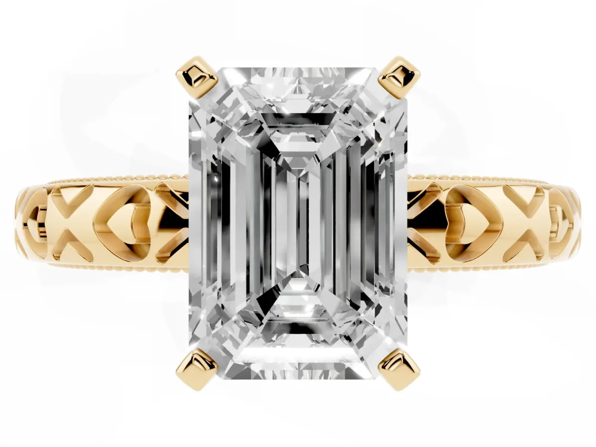 Emerald Cut Solitaire Diamond Engagement Ring with XO Engraved Band and Four-Prong Setting Yellow gold