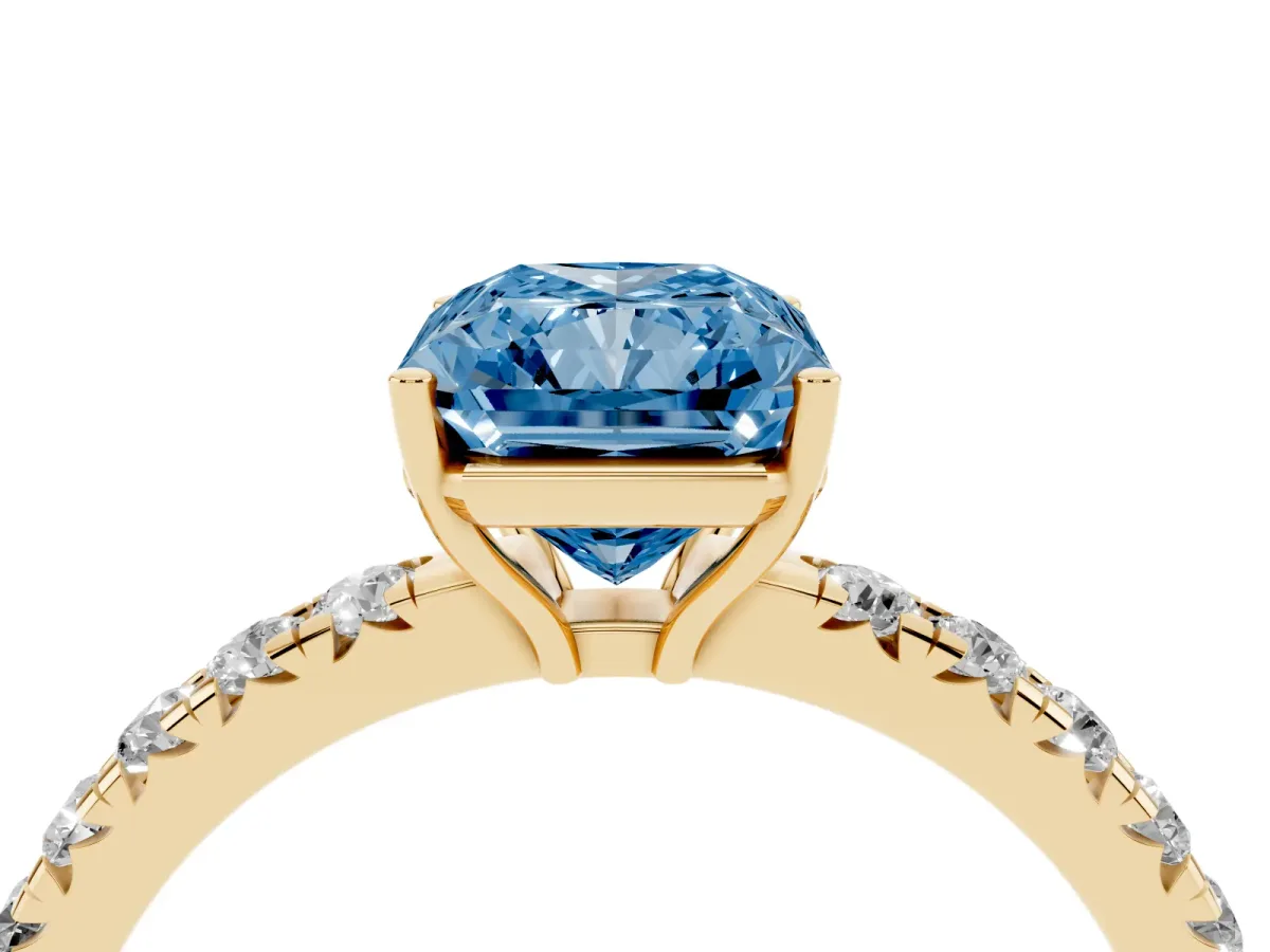 Fancy Blue Radiant Cut Diamond Pavé Solitaire Engagement Ring with Four-Prong Setting Yellow gold